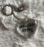 Llavero invisible string