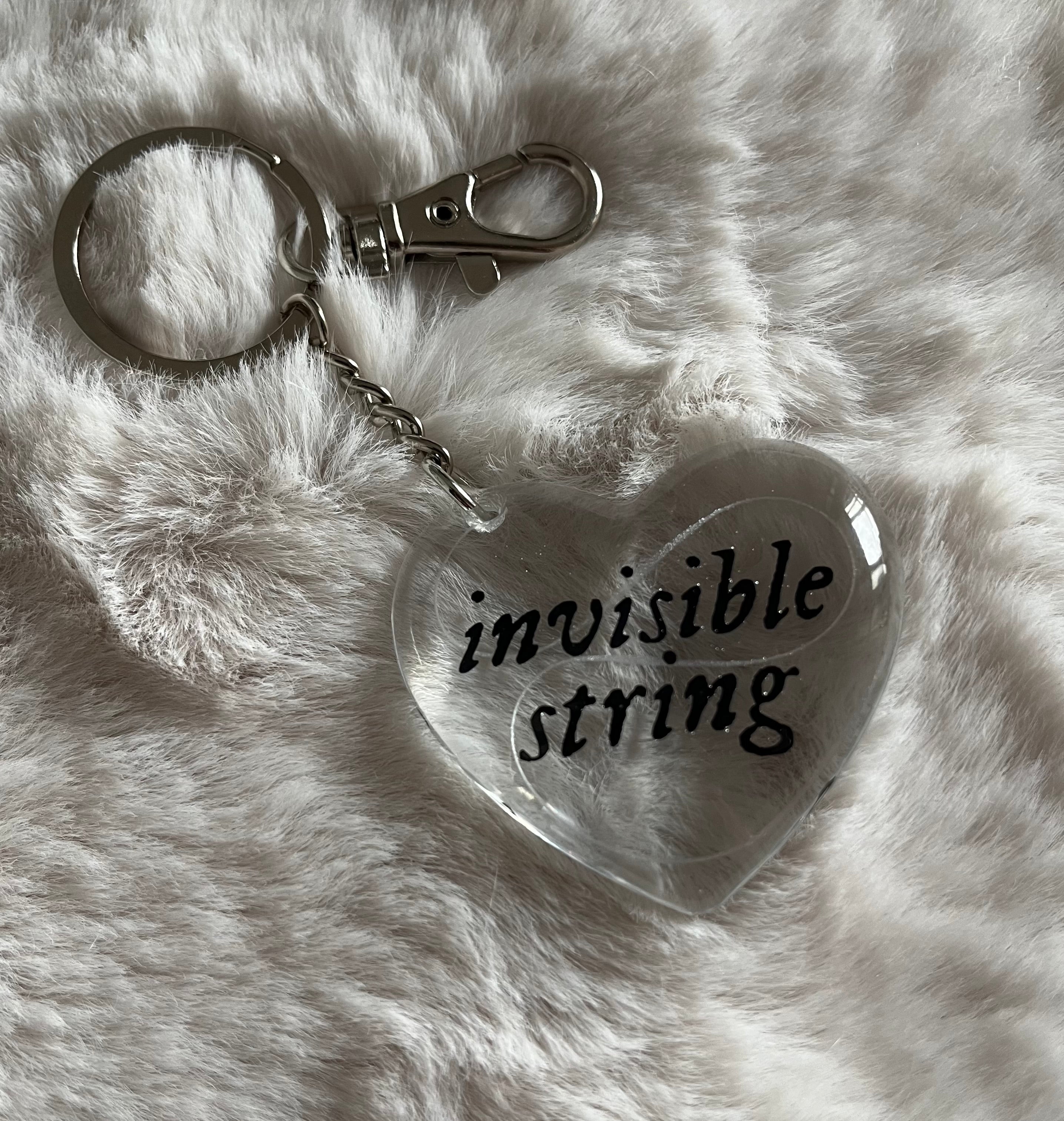 Llavero invisible string