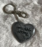 Llavero invisible string