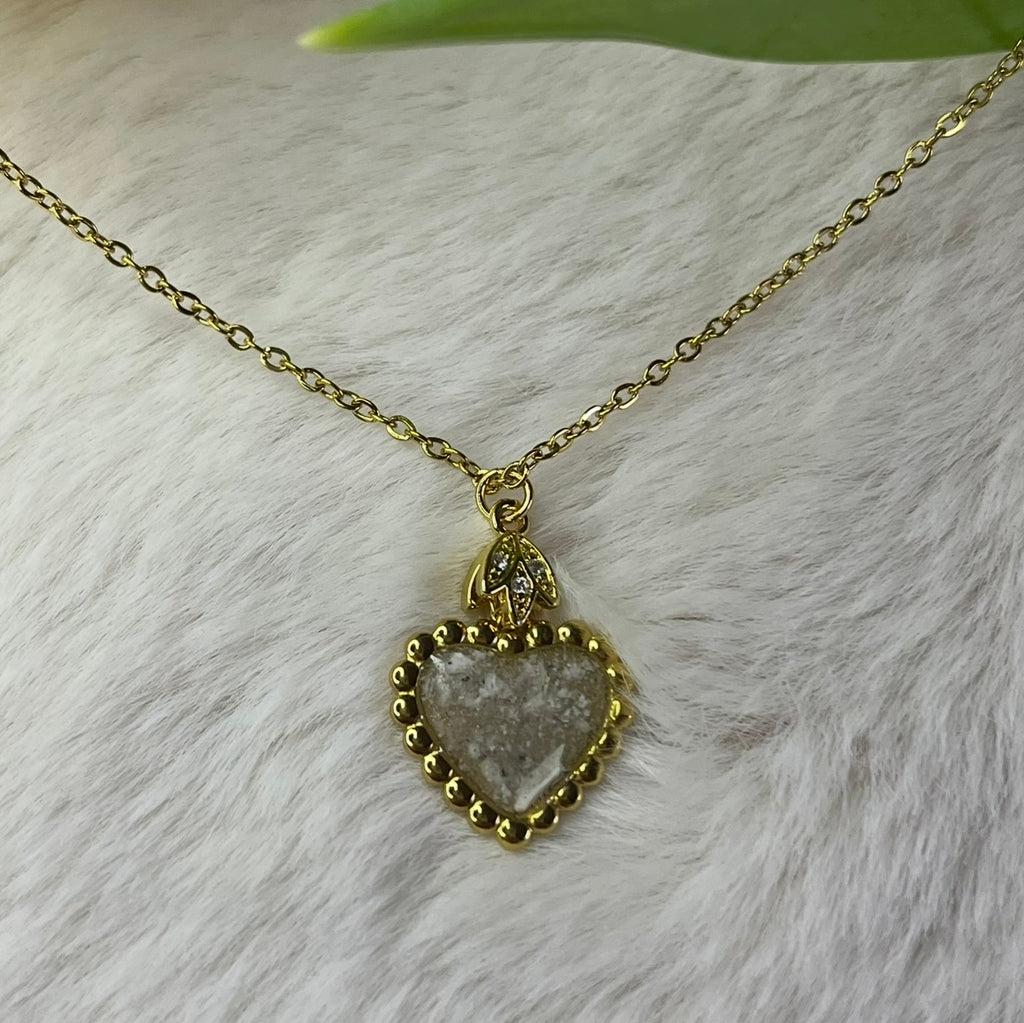 Colgante de corazón con cenizas