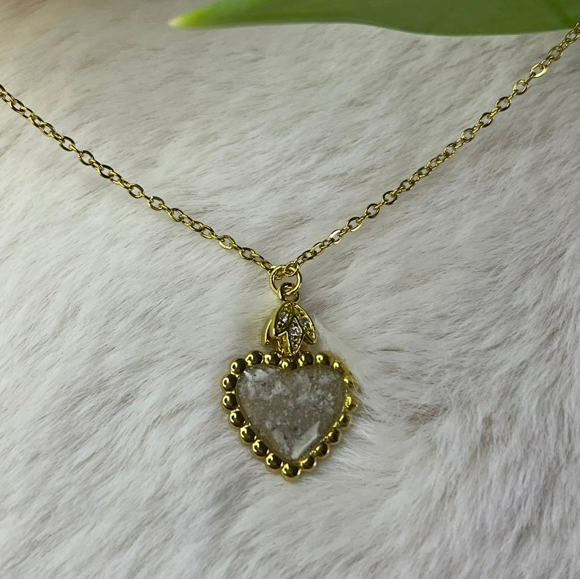 Colgante de corazón con cenizas