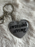 Llavero invisible string
